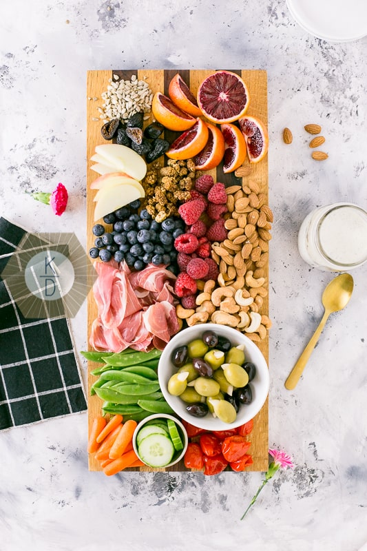 To celebrate meeting the challenge of doing Whole30, I created a lovely spread of Whole30 compliant snacks. This Paleo appetizer platter rivals any fancy cheese plate or charcuterie board around. It's chock full of healthy snacks.